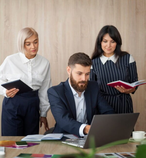 medium-shot-people-working-office_23-2149622844